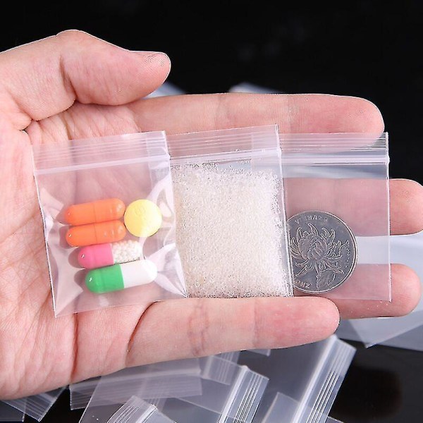 100-300 bitar Mini liten plastpåse Smycken Dragkedja Dragkedja Återförslutningsbar plast Transparent Mini