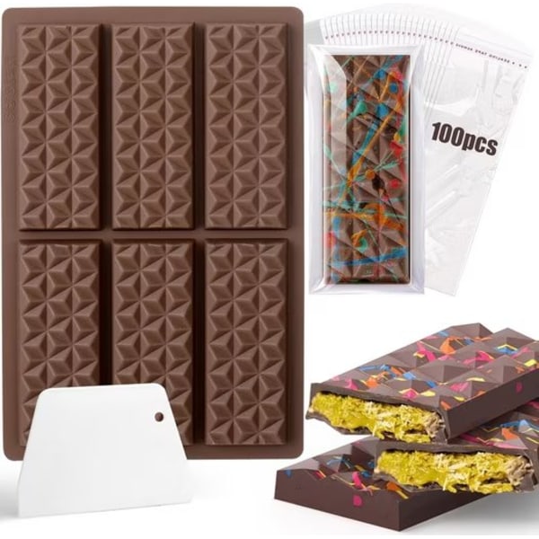 Denne chokoladeform inkluderer chokoladeplader, dybe chokoladeplader i silikoneform, samt en skraber og pose Diamantmodell 1 set