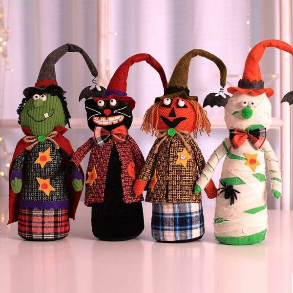 Halloween-koristeet, pukeutunut muumio, noita, kurpitsa, pöytä, nukke