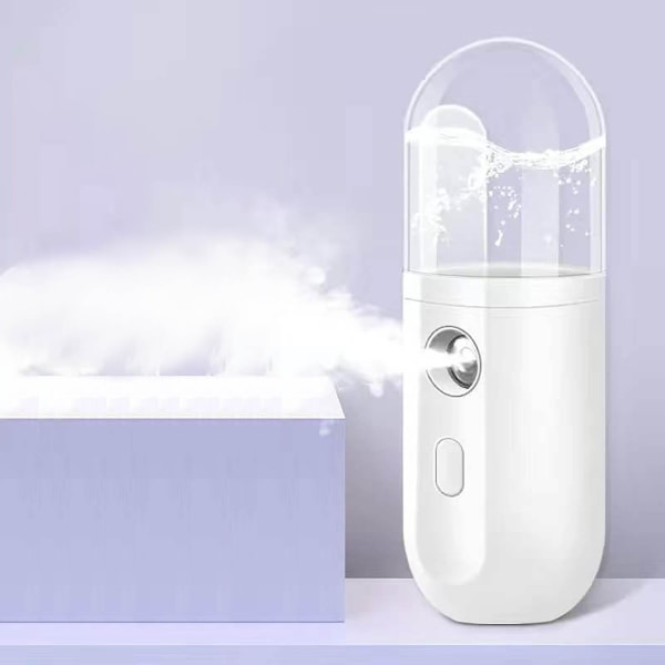 Ansiktsångare Nano Spray Fuktighetskräm Ansiktsluftfuktare Liten bärbar uppladdningsbart skönhetsinstrument Kallspraymaskin Ansiktsångare