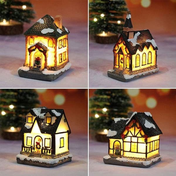 Dekorativ julescene med varmhvid LED-belysning.