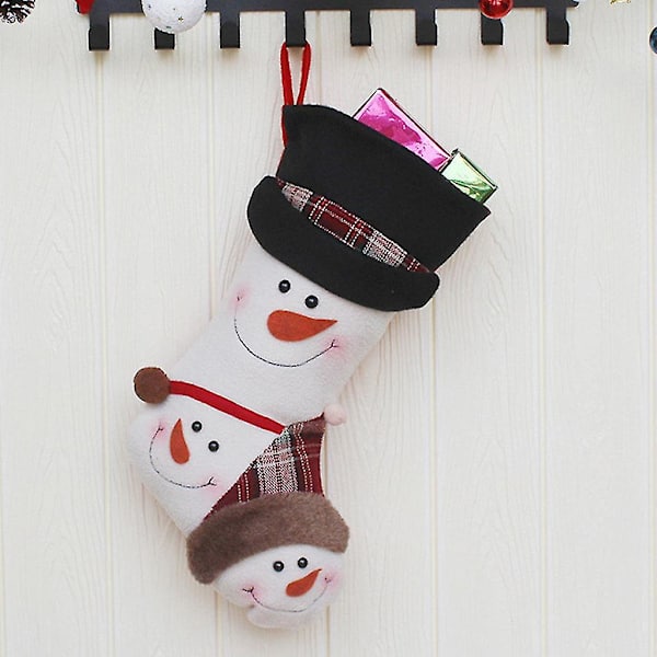 Julklappspåse med julstrumpor, snögubbe, juldekoration