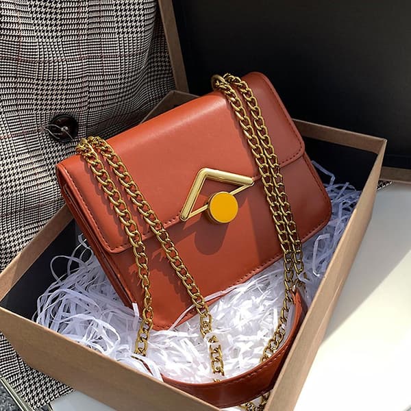 Crossbody-väskor för kvinnor - Sadelväska med lock i orange