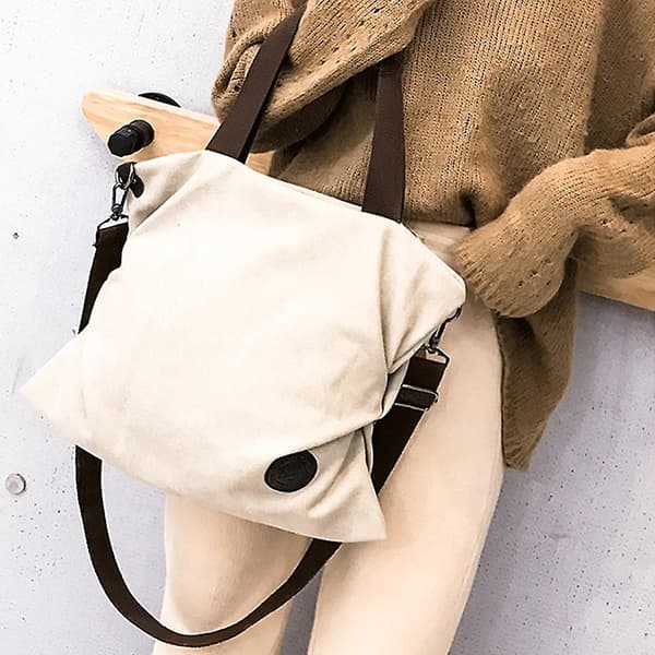 Damer med canvas crossbody-väskor, canvas handväskor, canvas plånböcker och handväskor. Vit