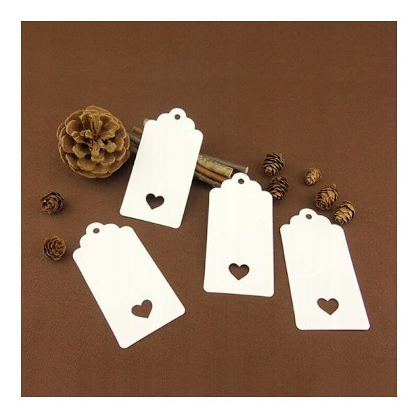 Julklappsetiketter 200. 4,5 cm x 9,5 cm presentlappar i kraftpapper och 30 m gult ritlim (vitt)