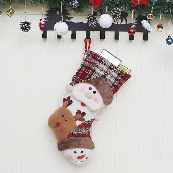 Julklappspåse med julstrumpor, snögubbe, juldekoration