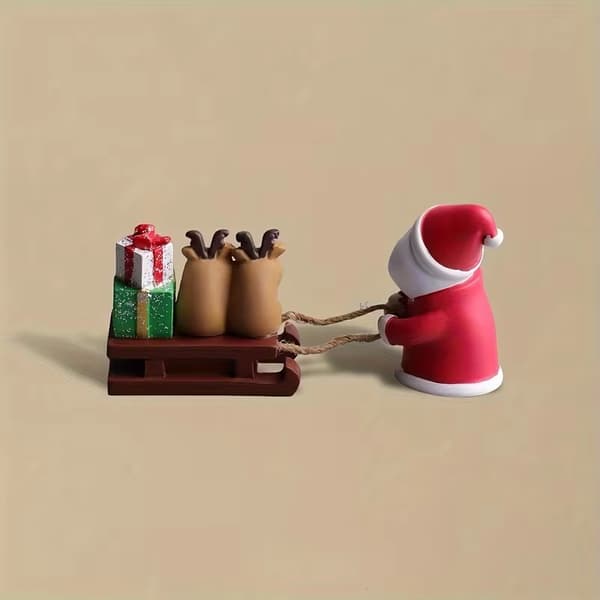 Moderne julemandsslæde miniaturefigur i harpiks til julepynt