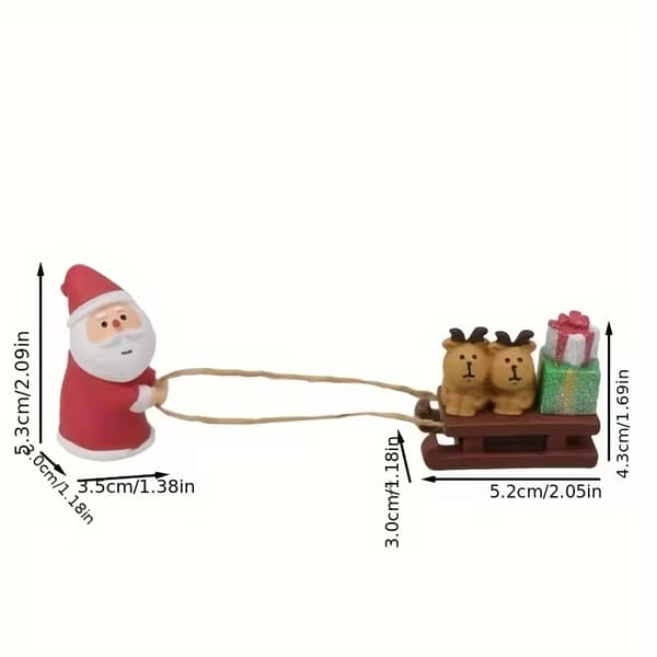 Moderne julemandsslæde miniaturefigur i harpiks til julepynt
