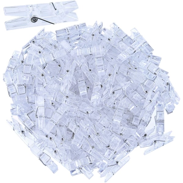 100 stycken Mini genomskinlig plastklämma hängande fotoklämmor