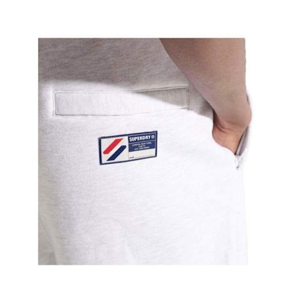 Sportstyle-applikoidulla kuviolla varustettu shortsi Superdry - jäävuorenvalkoinen mélange Glaciär vit fläckig XL