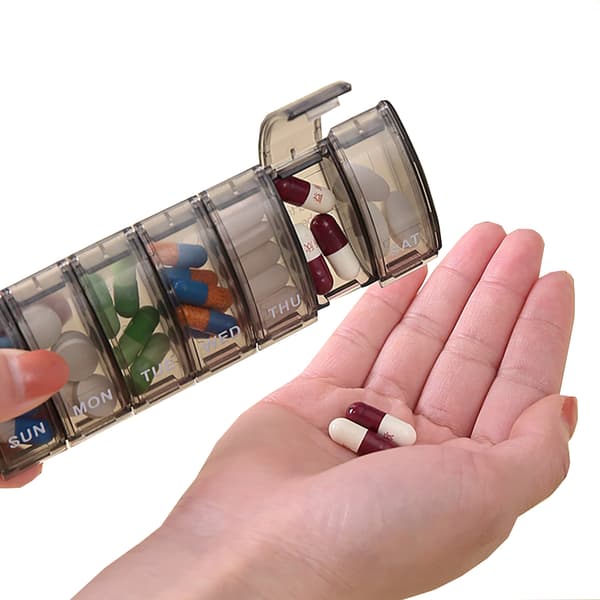 Holdbar tablettdispenser Blå