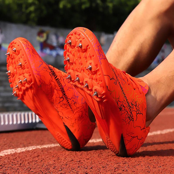 Herrspikade skor för friidrott, spikskor för löpning, hoppning, professionella löparskor med spikar, Hj259 Orange 35