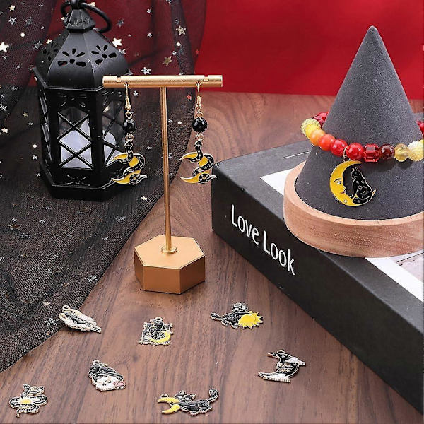 1 Laatikko 18 kpl 9 tyyliä Halloween-koruja, irtotavarana goottilaisia kuukoristeita, seosmetallisia emalitähdet, käärmeet, kissa, varis, korppi, eläin, ruusu, nokkakoru