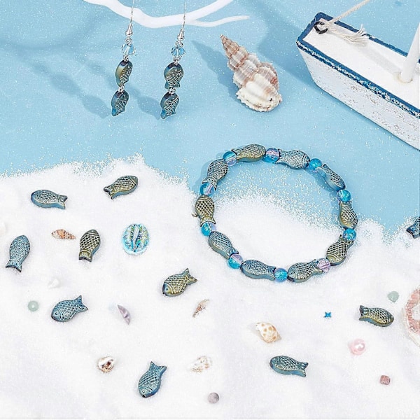 1 Eske 100 stk. Fiskperler Bulk Glass Fiskperle Charm Sommer Hav Havdyr Spacer Perler Dobbeltsidig Små Fisk Løse Perler for Smykkelaging Perling