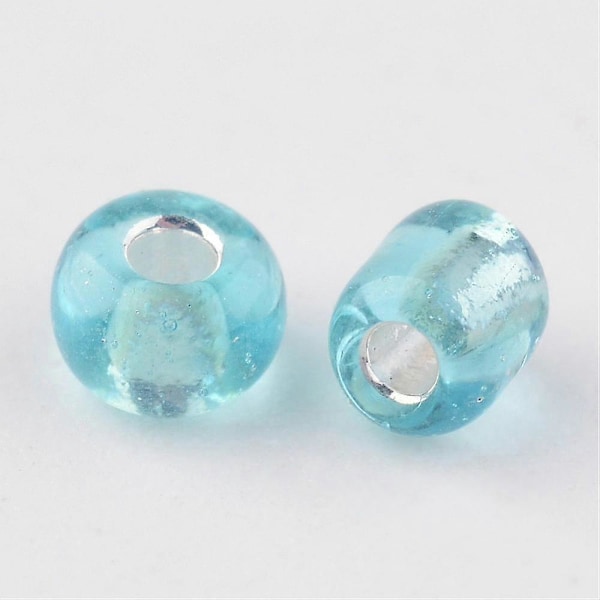 8/0 Glass Seed Beads Sølvforet Runde Hull Blekturkis 3mm Hull: 1mm ca 1097 stk/50g