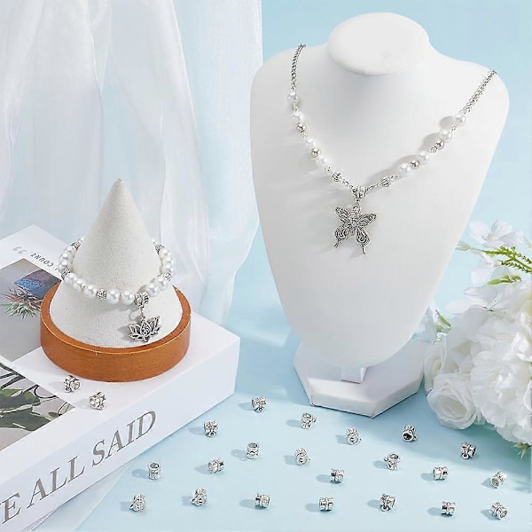 1 Ask 240 st Små Bail-Pärlor Silver Spacer Pärlor Charms Legering Texturerad Tibetansk Stil Cylindrisk Hängande Rörpärla Spännen för Smyckestillverkning Hänge N