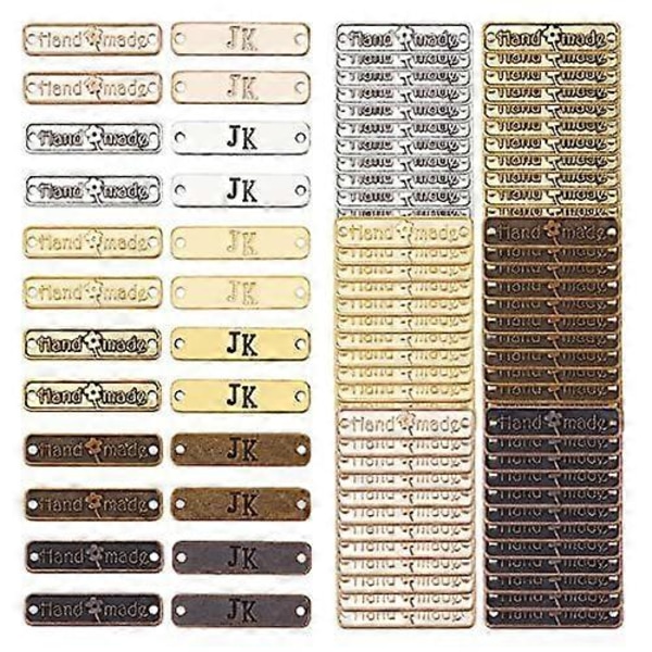 88 kpl Käsintehdyt metallimerkit Tiibetiläinen seos Käsintehdyt etiketit Riipushelmi Lumo Metallietiketti Merkit
