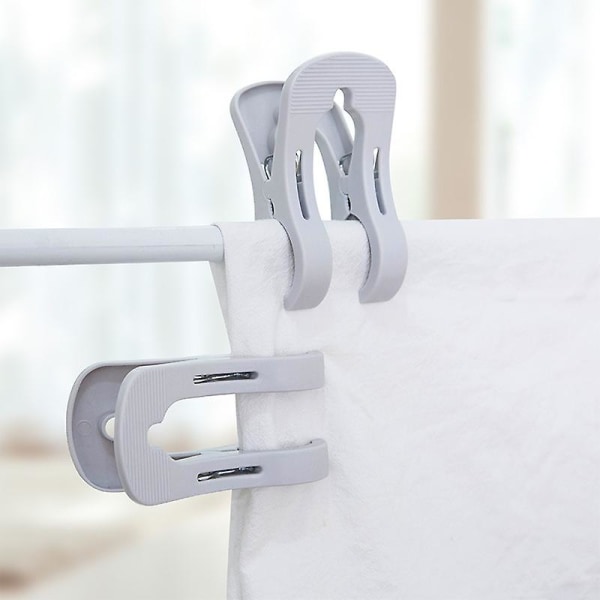 Grått Sett med 4 Tykke Multifunksjonelle Klesklyper i Plast