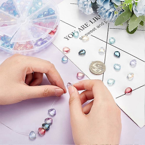 150 stk. 10 farver Transparente spraymalede perler Glitter Krystal Løse perler Dråbeformede perler Charms Topborede glasafstandsstykker til DIY håndværk