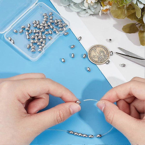 80 kpl ruostumattomasta teräksestä valmistettuja tynnyrihelmiä, ruostumattomasta teräksestä valmistettuja irtokappaleita, 2 mm pienireikäisiä pyöreitä helmiä, metallisia onttoja pallohelmiä, laskuvarjonaruhelmiä korujen valmistukseen