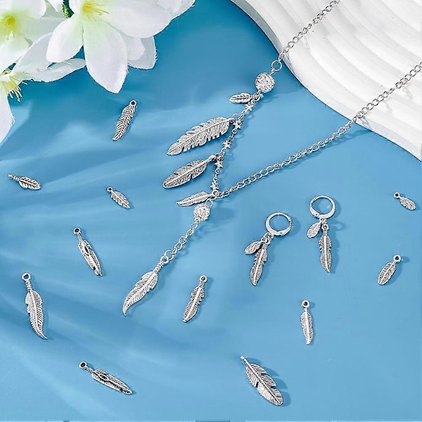 84 st 14 Stilar Fjäderberlocker Hängsmycken Fjäder Smycken Antik Silver Fjäderberlocker Tibetansk Stil Metallberlocker Pärlor för Drömfångare Halsband