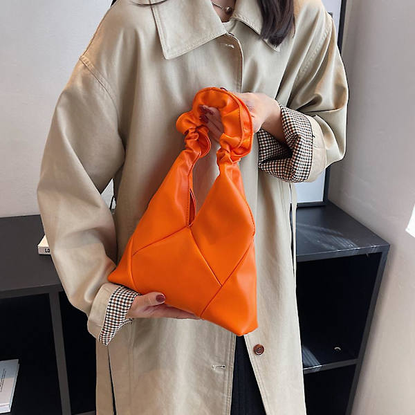 Uusi ranskalainen niche-design laskostettu pilvikassi rombinen naisten kannettava PU-olkalaukku orange