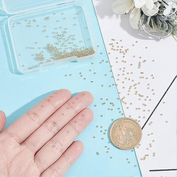 Noin 400 kpl 24K kullattuja välihelmiä 1,5 mm Rondelle ruostumattomasta teräksestä valmistettuja helmiä Metallisia stopperihelmiä DIY-kaulakorujen rannekorujen korujen valmistukseen