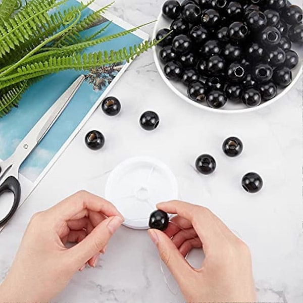 100 kpl Suuria reikiä puuhelmiä 20mm pyöreitä makramehelmiä mustia puupallohelmiä löysiä välihelmiä Halloween DIY-seppeleen kaulakorun korujen valmistukseen Han