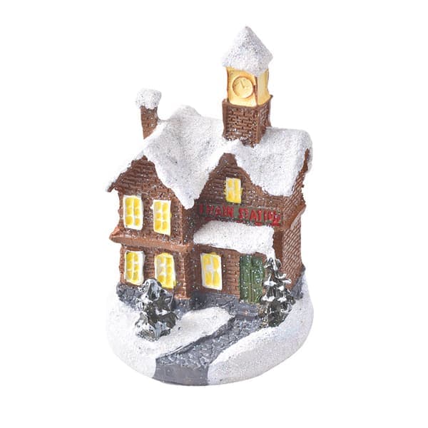 Julelandsby med huse med lys, oplyst juleharpiks