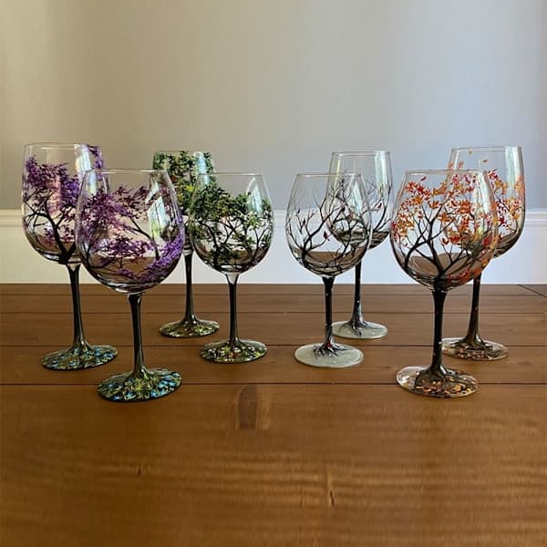 Fire årstider tre vinglass sesongbasert glasskopp winter