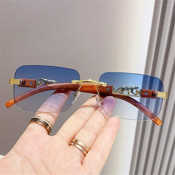 Trendiga Rimless Cut Edge Solglasögon Unika Solglasögon med Geparddesign Gradient Tea