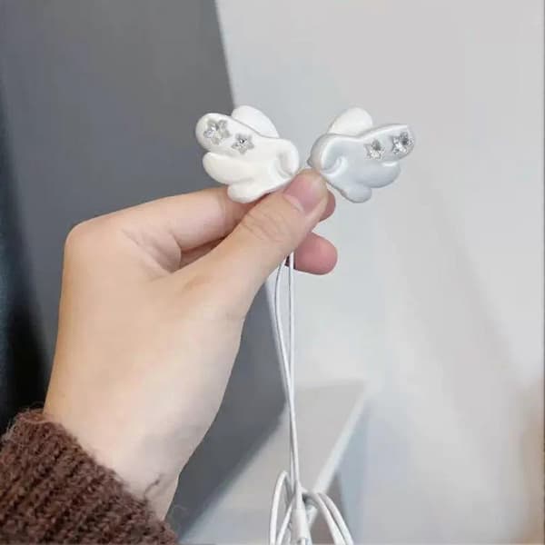 Englevinge øretelefontilbehør for kablede ørepropper, klipsdekorasjon med glitrende stjerner Pink 2pcs
