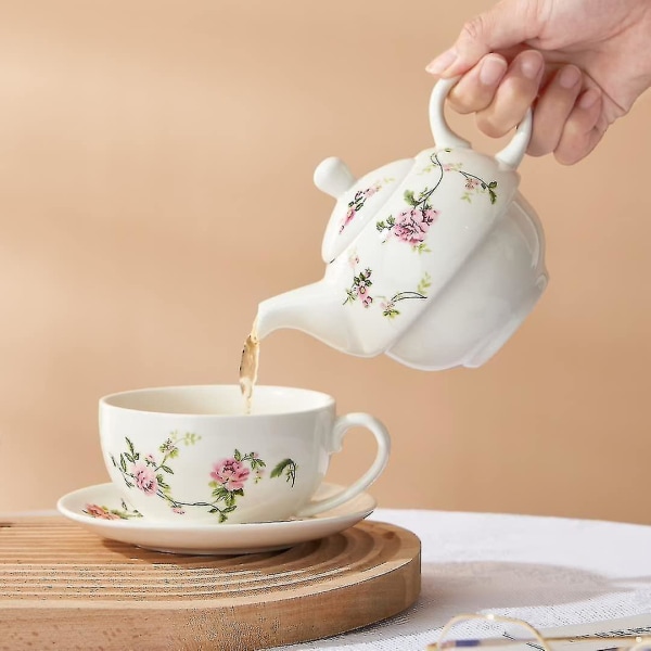 Porselenste for en, blomstertekanne og koppsett, rottingblomster