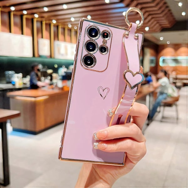 Samsung Galaxy S24 Ultra -kotelo rannehihnan ja telineen kanssa, Rakkaussydän-kuvioitu reunus, pehmeä TPU-iskuja vaimentava suojakotelo naisille Pink For Galaxy S24 Ultra