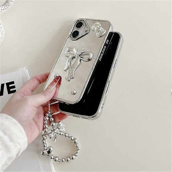 For iPhone 16 Deksel 3D Sløyfe Speiloverflate Design Telefon Bakdeksel med Stropp