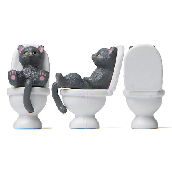 Söpö kissanpentu, joka istuu wc-koristeella PVC-patsashahmon työpöydän koristelu Grey 1Pc