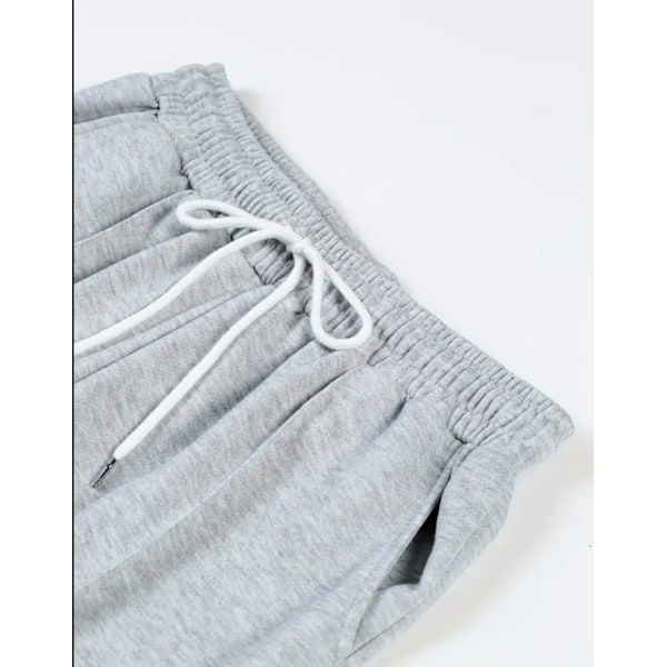 Miesten urheilulliset rennot neljän vuodenajan pitkät levenevät housut slim fit -mallia joustavalla kiristysnyörillisellä vyötäröllä, yksiväriset Light Gray S