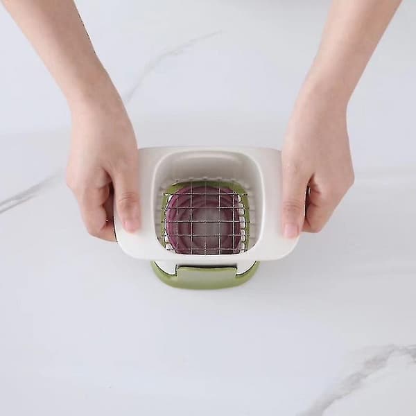 Vegetabilskhakker i hånden