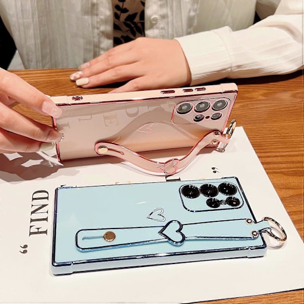 Samsung Galaxy S24 Ultra -kotelo rannehihnan ja telineen kanssa, Rakkaussydän-kuvioitu reunus, pehmeä TPU-iskuja vaimentava suojakotelo naisille Pink For Galaxy S24 Ultra