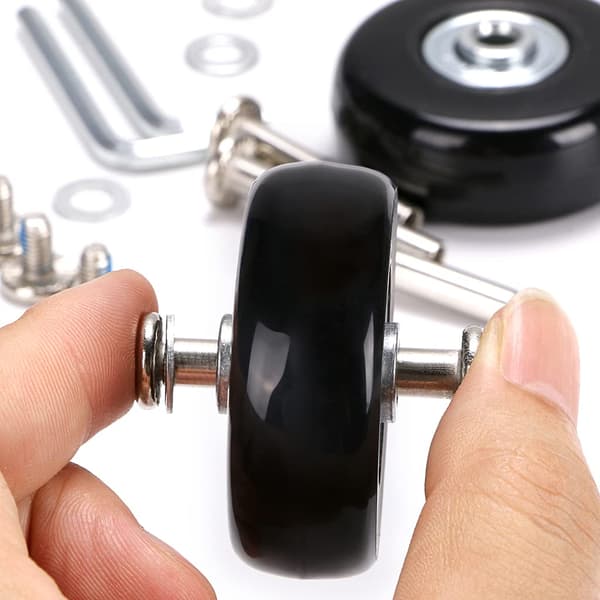 4-pakning med utskiftbare svingbare gummihjul til kofferter, 45 x 18 mm