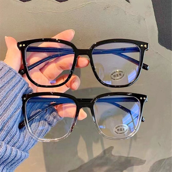Unisex blå lysblokkerende briller Lette reseptfrie briller Briller for spilllesende studenter Transparent Gray Frame