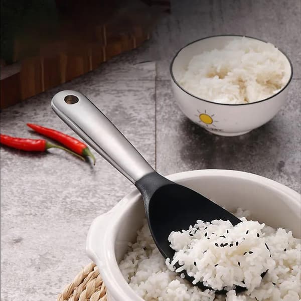 Svart silikonskjeskje for non-stick-panne