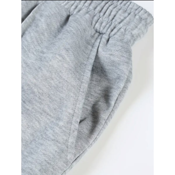 Miesten urheilulliset rennot neljän vuodenajan pitkät levenevät housut slim fit -mallia joustavalla kiristysnyörillisellä vyötäröllä, yksiväriset Light Gray L