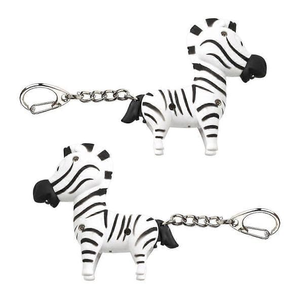 2 stk. Zebraformede LED-lyd- og glødende nøgleringe (tilfældig stil) 7.00X6.60X2.30CM