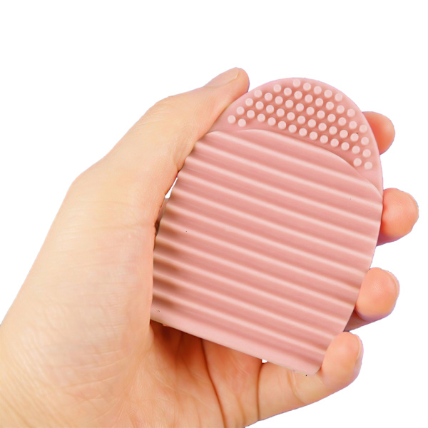 Meikkisiveltimien puhdistus - Brushegg-sivellinpuhdistin Rosa