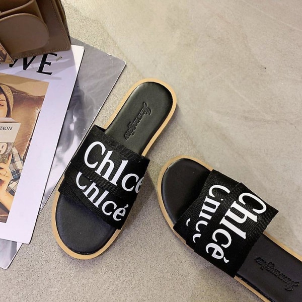 2024 Dam Låg Klack Canvas Tygtofflor Designer Nya Sommarskor Platta Sandaler Strandsandaler för Kvinnor Tofflor Kvinnor Beige 39