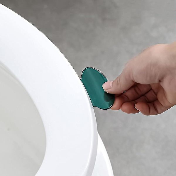 Set med 2 självhäftande stänger för toalettstol