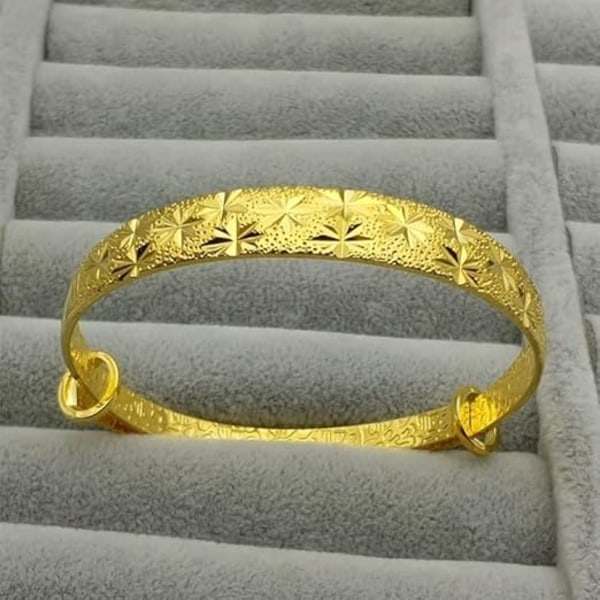 Delikat och vacker guld- och silverarmband med snöflinga, guldsilver-smycken. Med en vacker stjärn- och mångarnpåse