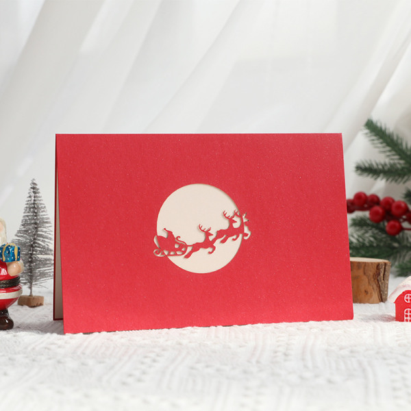 1 3D-joulukortti, jossa näkyy Joulupukin hirven tervehdys