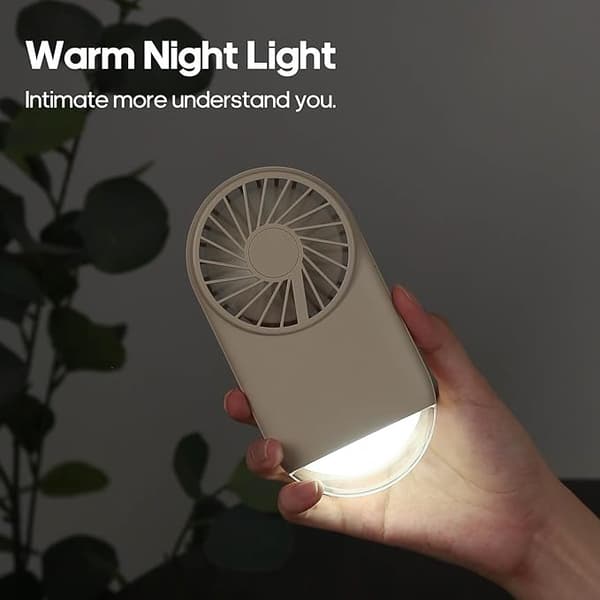 Kädessä pidettävä minituuletin telineellä